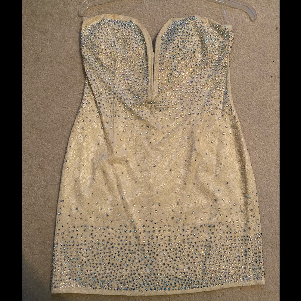 Cream colored lace and AB stoned short dress.